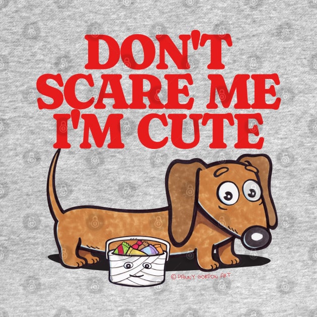 Cute and Funny Doxie Dachshund Don't Scare Me I'm Cute with candy going trick or treat on Halloween tee by Danny Gordon Art